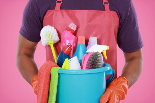 Carpet cleaning team preparing equipment before a scheduled service